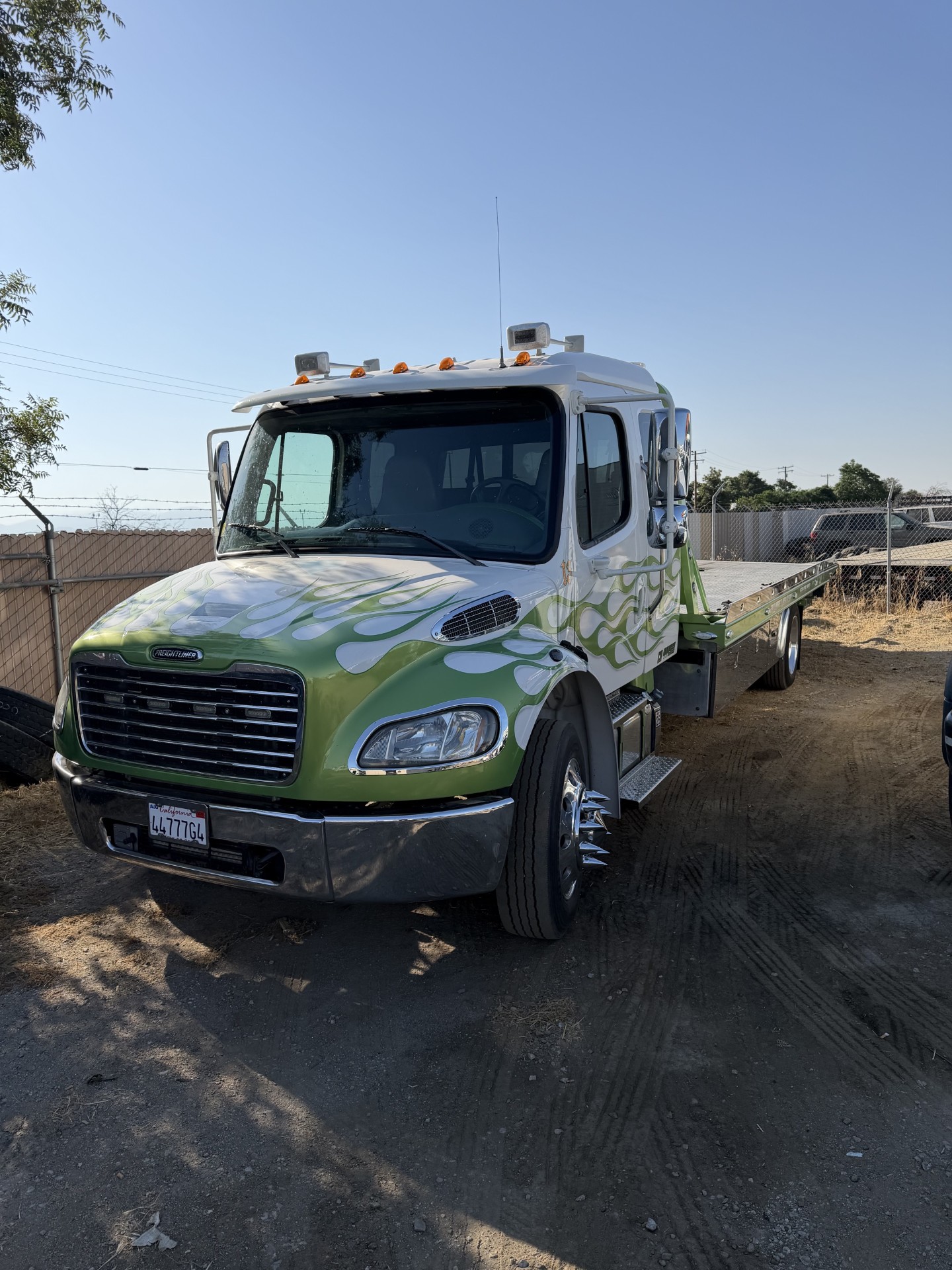 Green and White Tow Truck